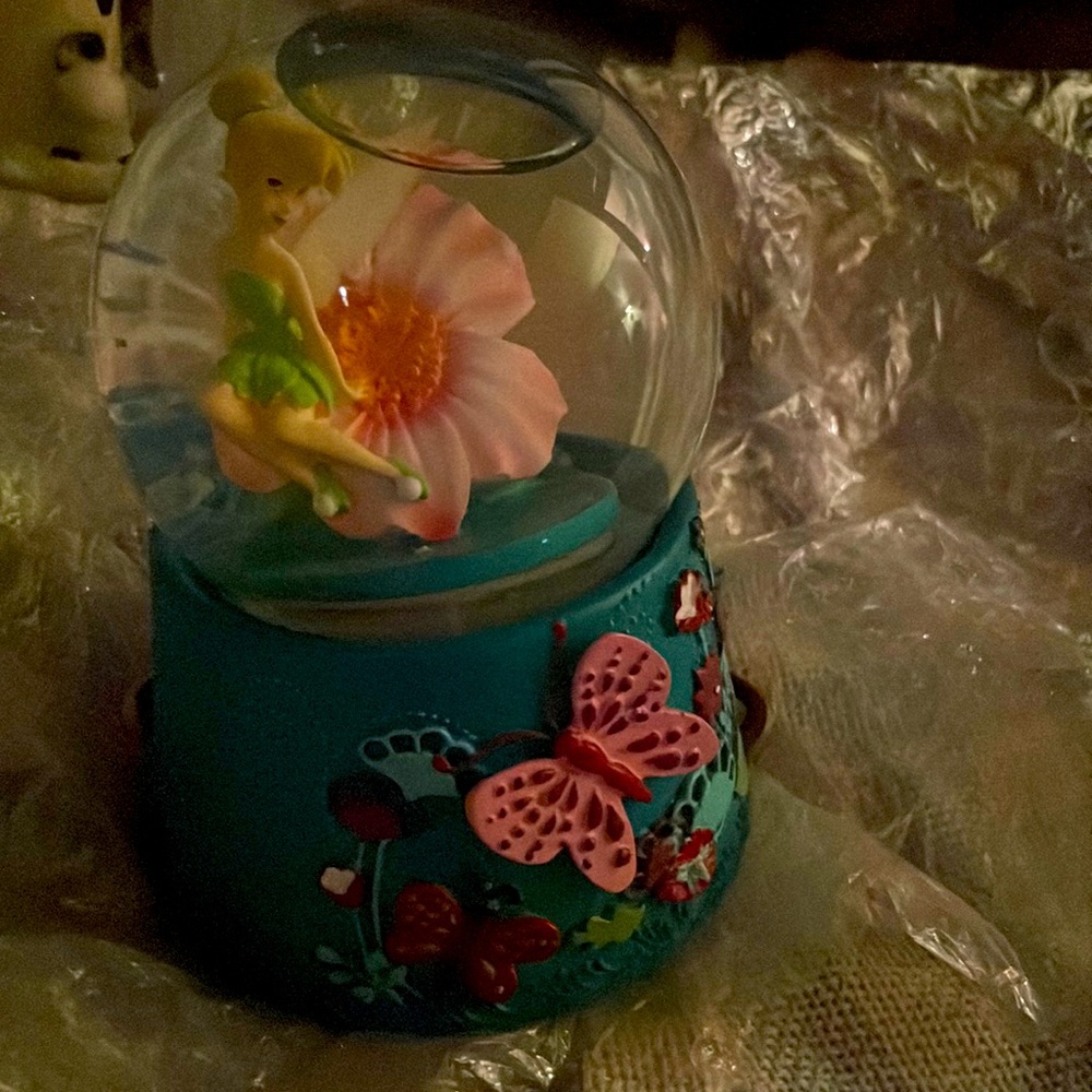 It’s from Disney it’s had tinker bell inside it’s from Disney store in NYC